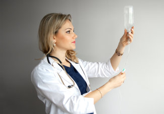 female doctor checking iv